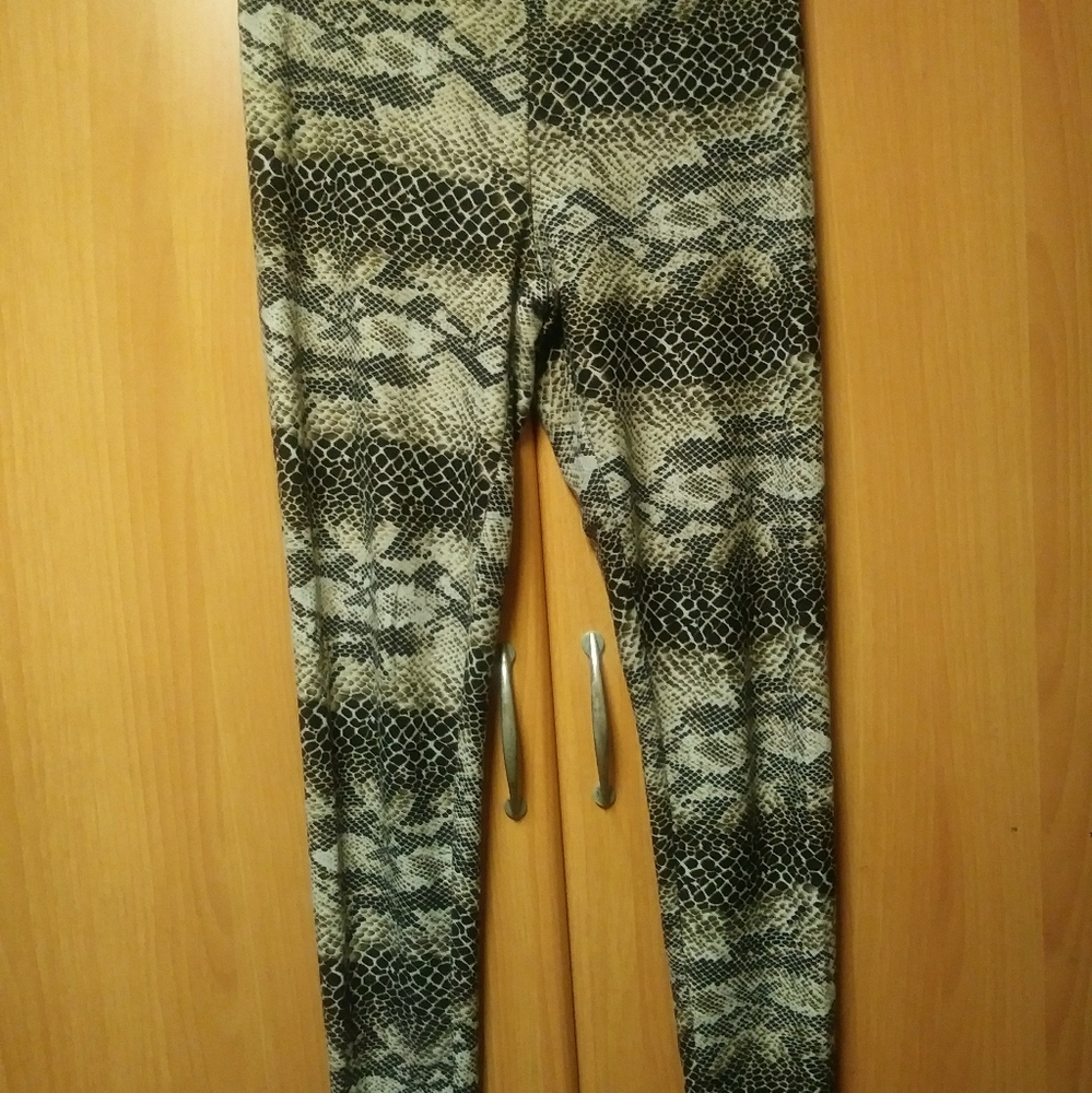 Leopard print thighs. Polyester and lycra material